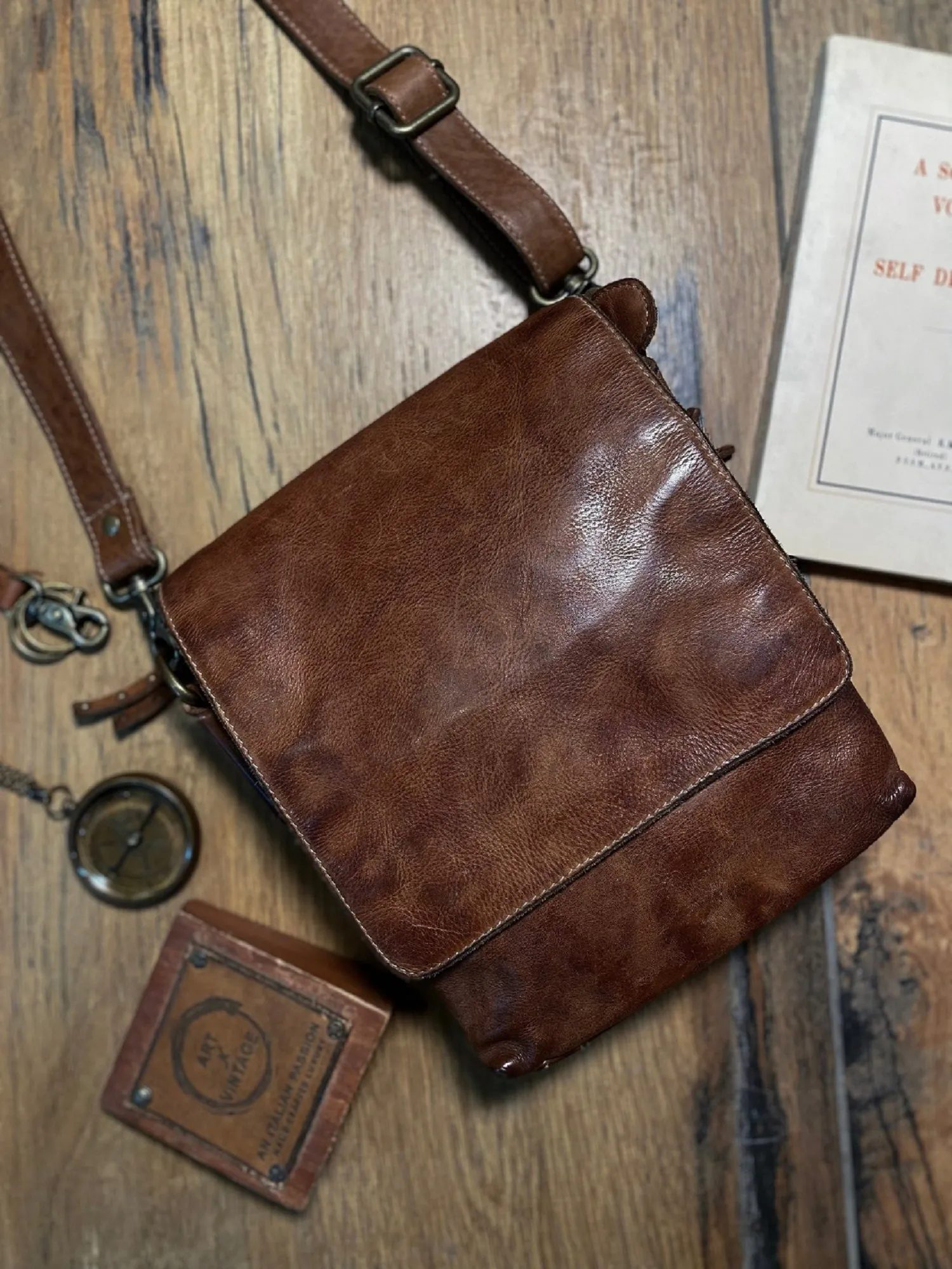 Henry: Cognac Flap Bag Cross Body In Veg Tan Leather by art vintage