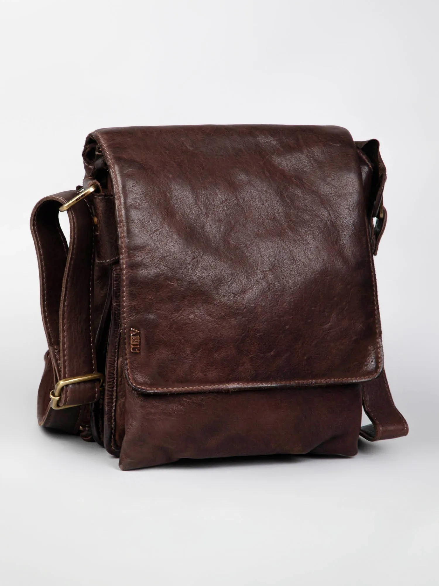 Henry: Cognac Flap Bag Cross Body In Veg Tan Leather by art vintage