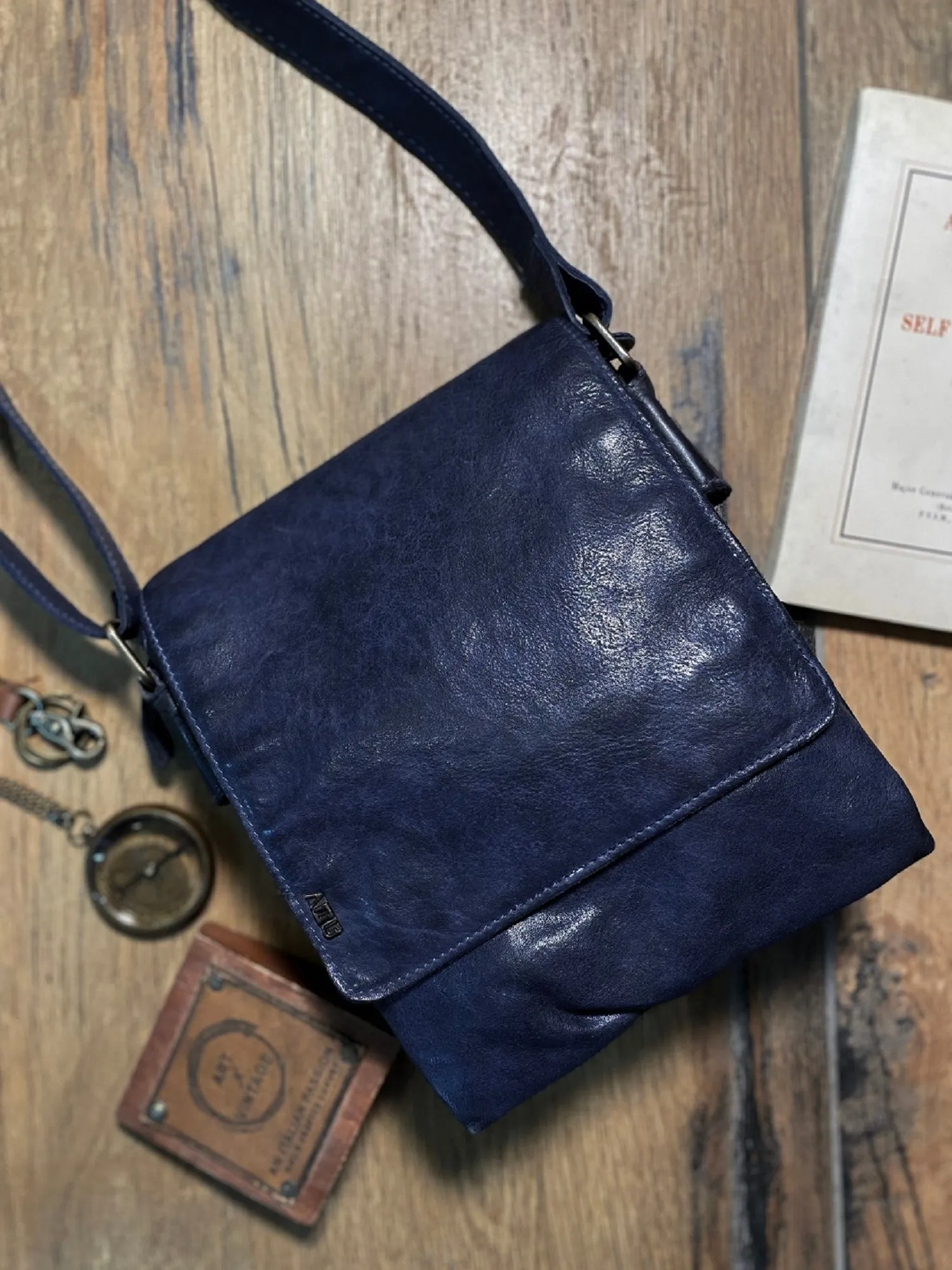 Henry: Navy Flap Bag Cross Body In Veg Tan Leather by art n vintage