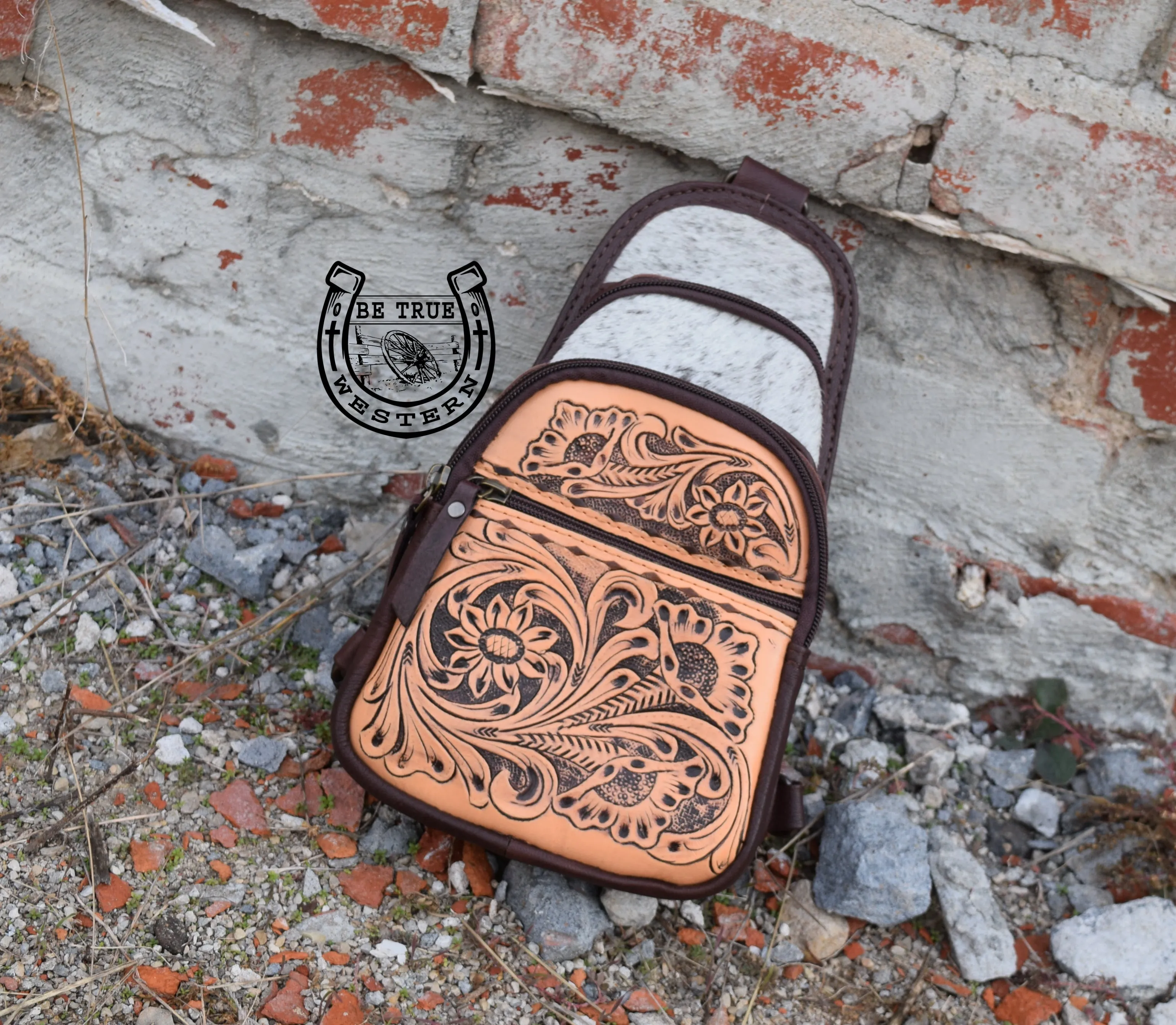 The Cowhide Sling Crossbody Bag