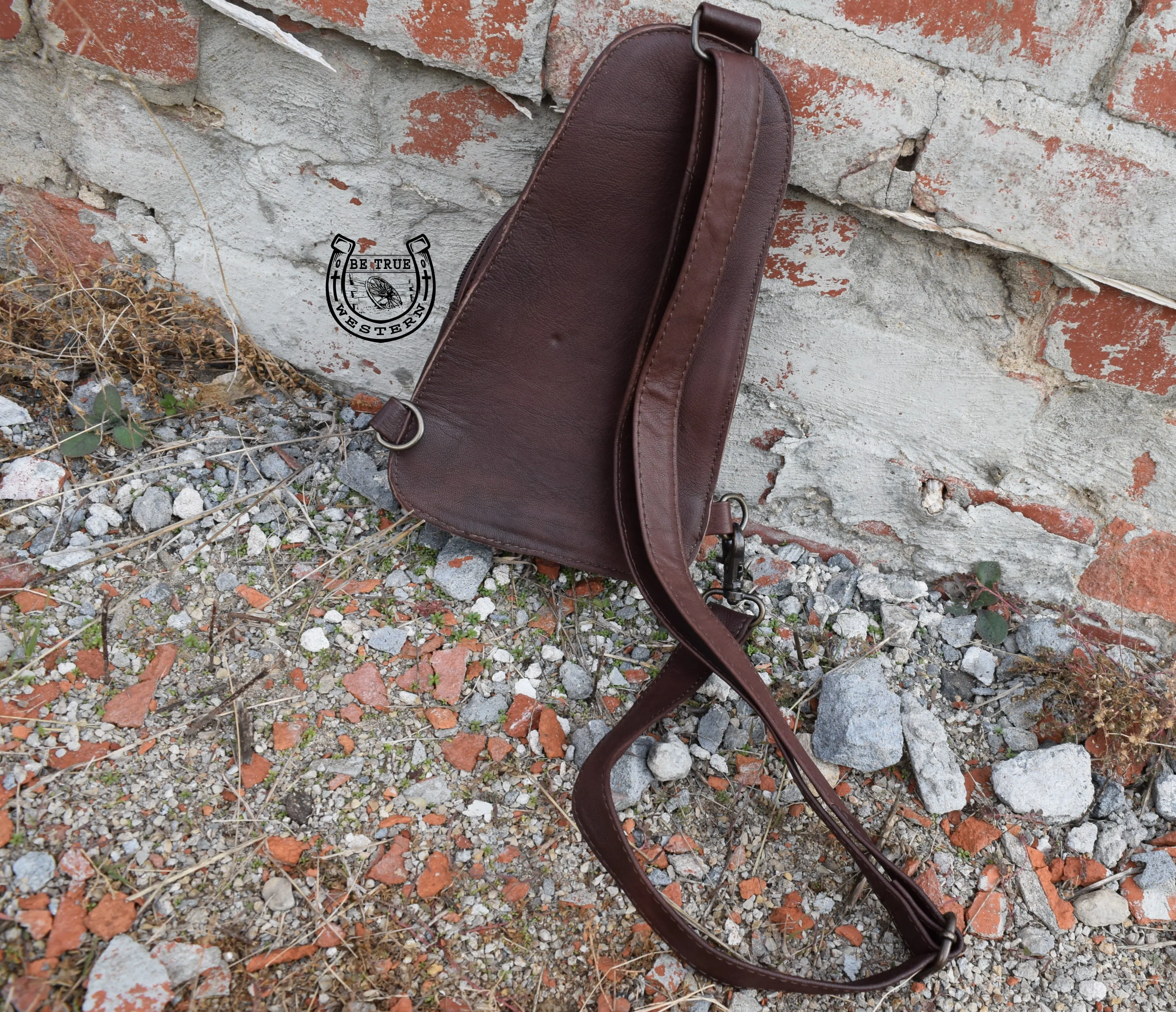 The Cowhide Sling Crossbody Bag